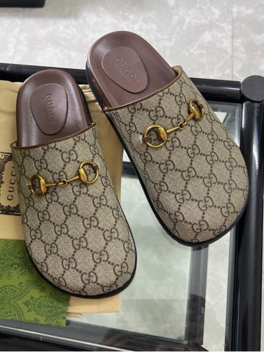 Gucci Women’s GG Monogram Mules with Gold Horsebit Hardware